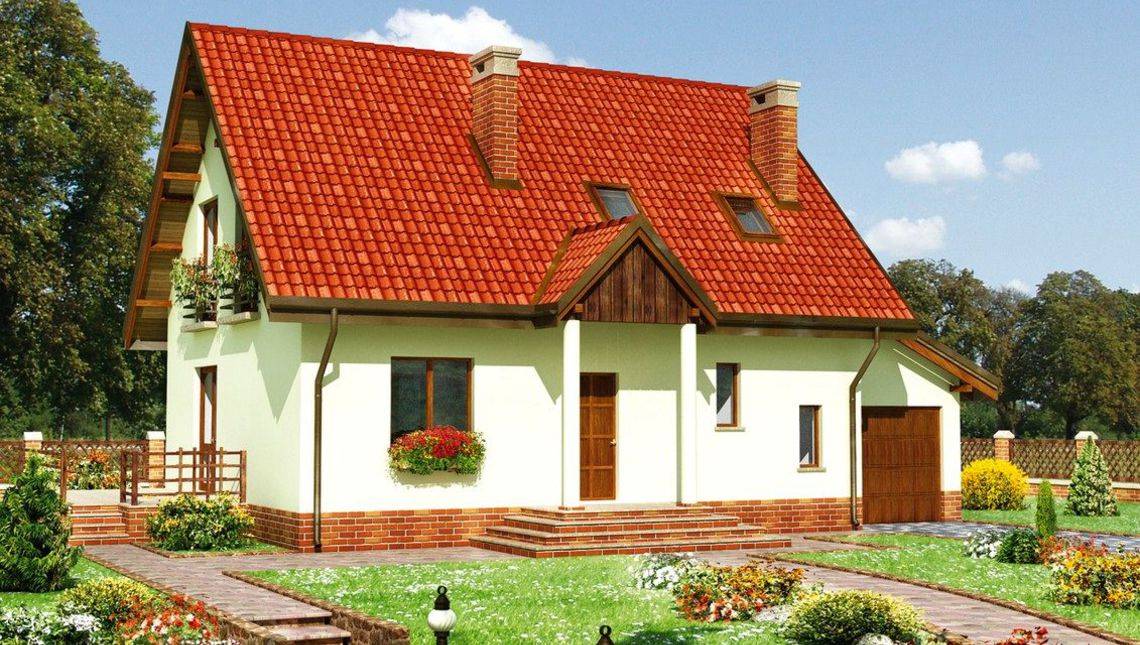 Красивый двухэтажный дом в европейском стиле с пристроенным гаражом